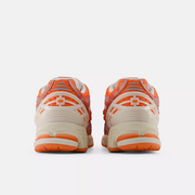 New Balance 1906R Tangerine Heat with Stone Pink